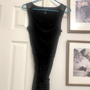Adorable black dress with bling on shoulders and bottom half of dress.